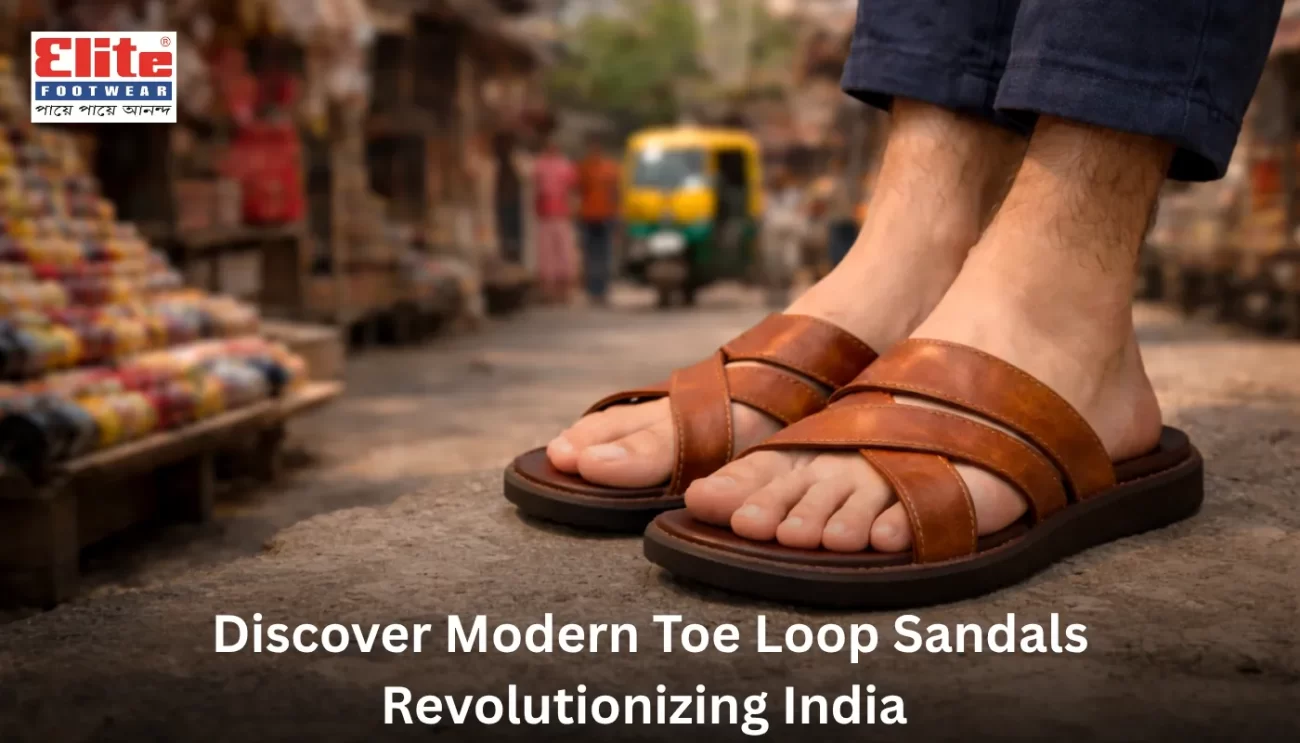 A person wearing tan leather modern toe loop sandals on a cobblestone street with a yellow Kolkata auto-rickshaw in the background.